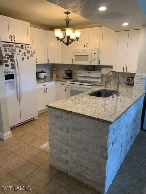 apt-223-8224 Key Royal Cir, NAPLES, FL, 34119-6797 | Card Image