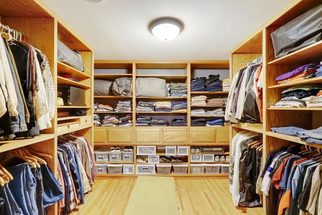 Words cannot describe this amazing, huge walk-in closet with all custom solid wood cabinetry. | Image 26