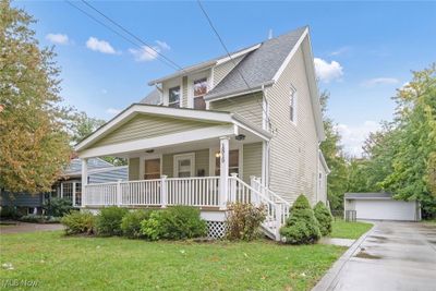 Concrete drive and 2 car detached garage. | Image 2