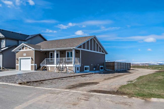 2001 31 Avenue, Home with 4 bedrooms, 2 bathrooms and 2 parking in Nanton AB | Image 27
