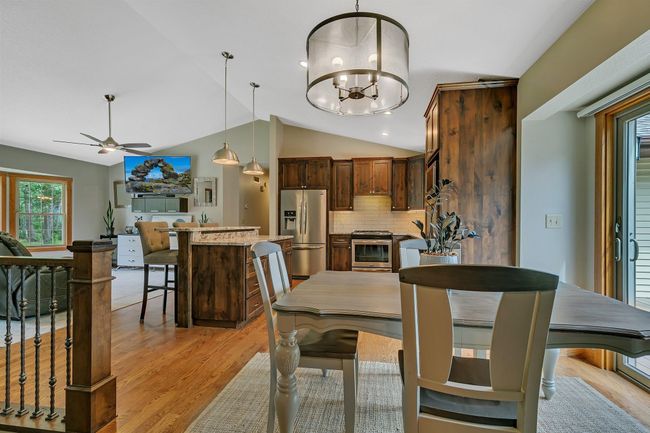 Spacious dining room with access to expand dining space to outside deck | Image 12