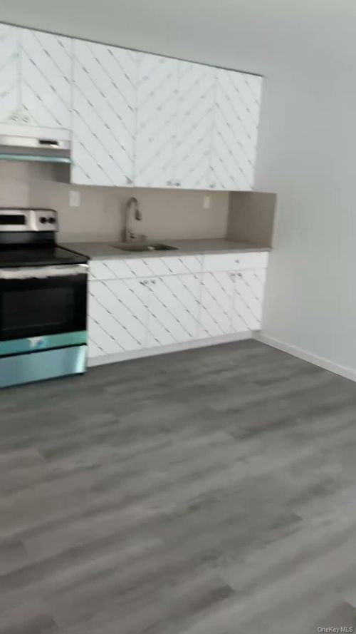 2j-7040 45th Ave, Woodside, NY, 11377-5107 | Card Image