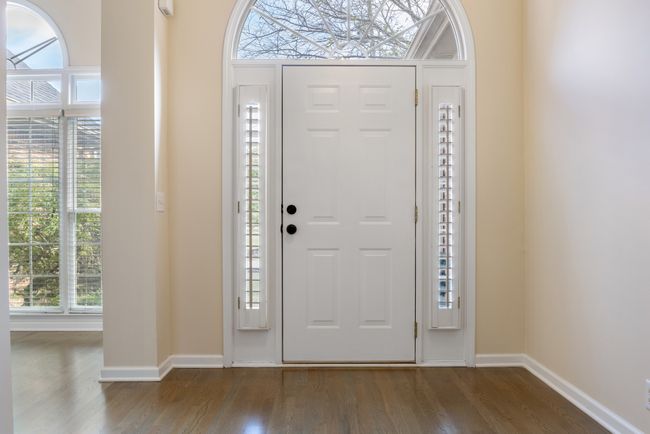 Gracious entry foyer with hardwood floors welcome you and your guests | Image 4