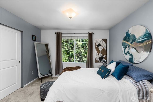 Primary suite overlooking the green space. | Image 10