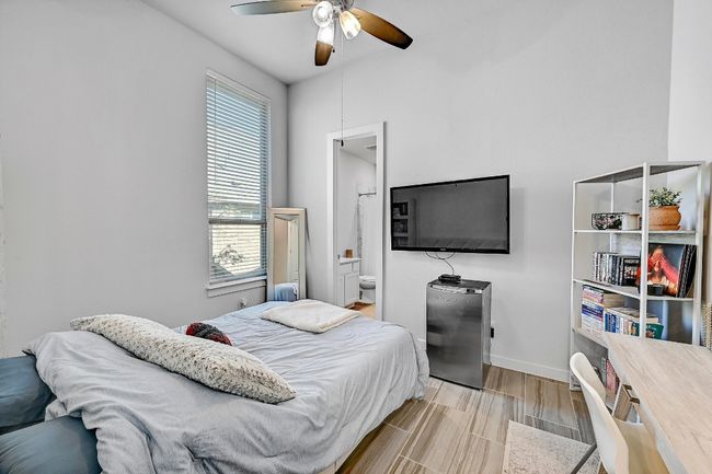 Each guest bedroom is designed for maximum comfort, making it a perfect space for visitors to unwind during their stay. 2/2 | Image 21