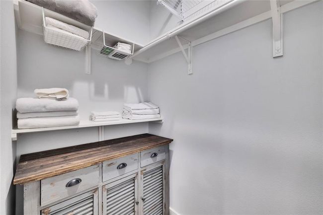 View of spacious closet | Image 15