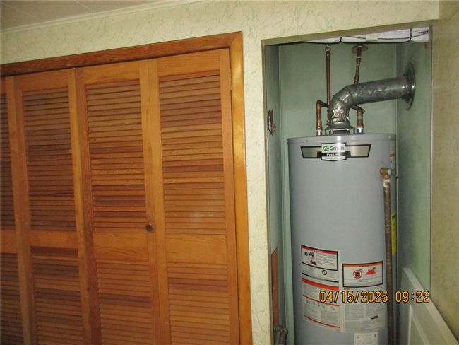 Utilities with gas water heater | Image 21