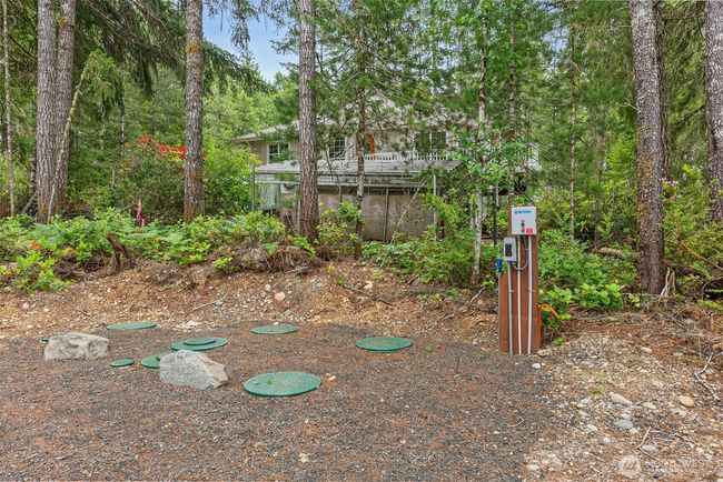The septic permit allows for a 4 bedroom home. There are 2 septic tanks on this property. This one for the house which is a NuWater BNR-500 ATU Tank. The septic tanks were installed in 2022. | Image 14