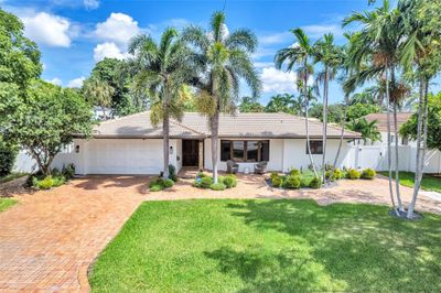 4 Bedroom / 4 Bath / 2 Car garage / Renovated / Freshly Painted home located in desirable Lighthouse Point | Image 2