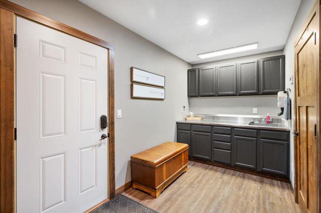 Lower level mud room off tuck-under garage | Image 30