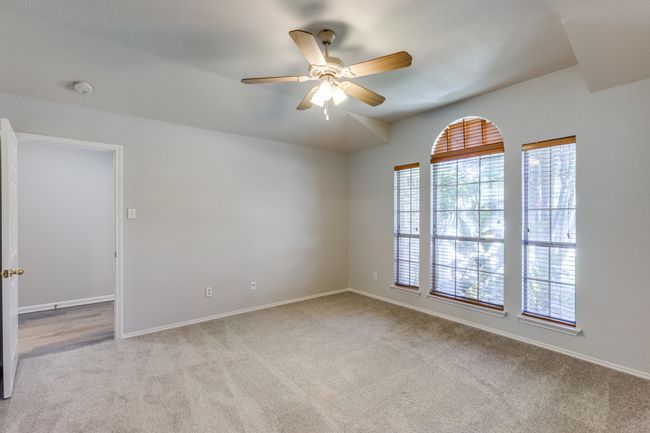 Office and or office #4 bedroom as well Carpeted spare room with ceiling fan and a smoke detector | Image 17