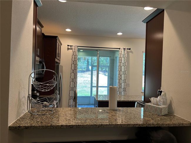 pass through from kitchen into living | Image 15