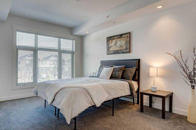 104 - 15 Aspenmont Heights Sw, Home with 2 bedrooms, 2 bathrooms and 1 parking in Calgary AB | Image 11