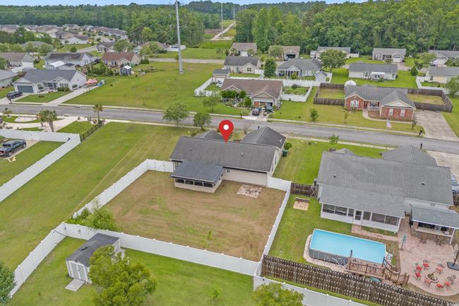 Aerial view of residential area with a pool area | Image 5