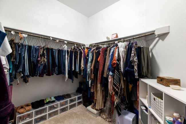 Walk in closet featuring carpet floors | Image 33