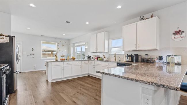 Beautiful kitchen with lots of counter space. | Image 10