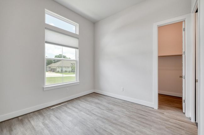 Spare room with light wood-style floors and baseboards | Image 23