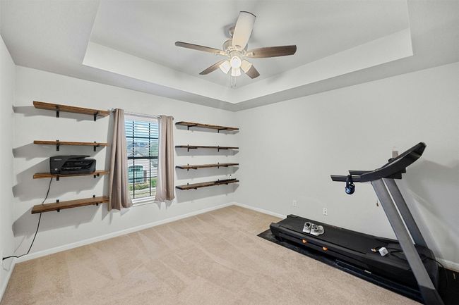Third bedroom upstairs currently being used as home exercise area | Image 21
