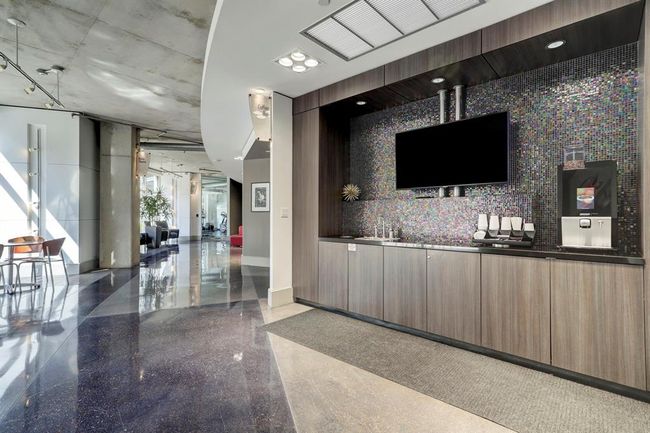 Contemporary coffee bar and lounge—perfect for socializing or unwinding. | Image 21