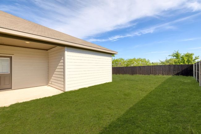View of yard with a fenced backyard | Image 28