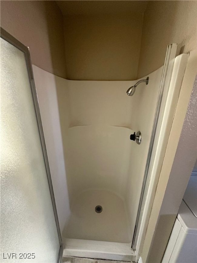 Bathroom featuring a stall shower | Image 12