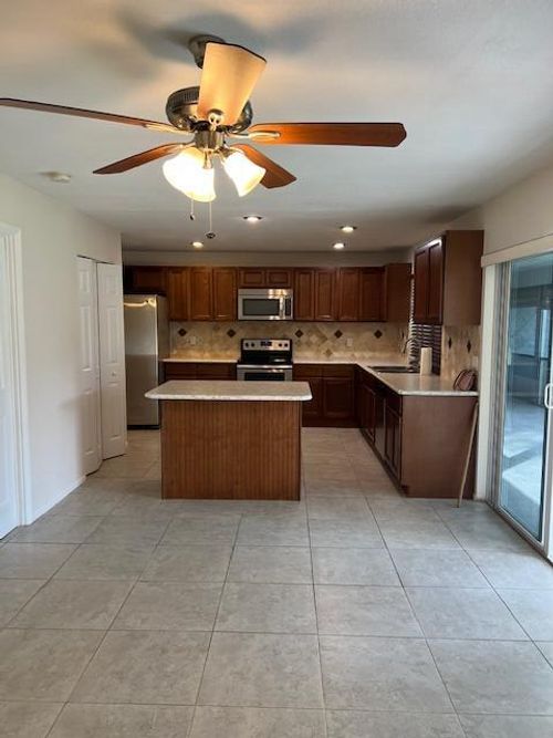 153 Meadowlark Dr, Royal Palm Beach, FL, 33411-2966 | Card Image