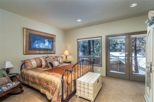Bedroom with light colored carpet, french doors, and access to outside | Image 28