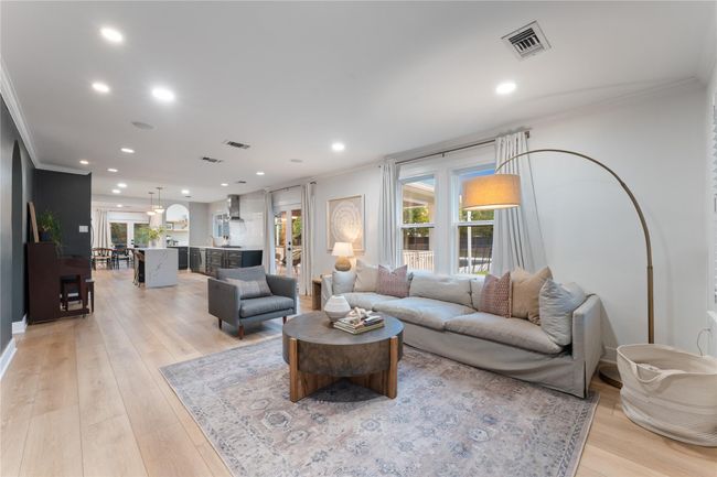 As soon as you walk-in, natural light floods the space with double-pane windows and plantation shutters | Image 7