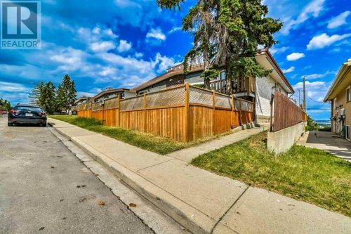 1-7524 Hunterview Dr Nw, Calgary, AB, T2K5E4 | Card Image