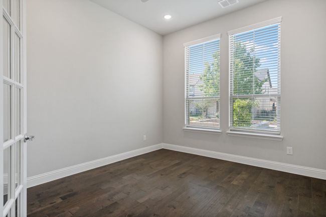 Unfurnished room featuring baseboards, visible vents, recessed lighting, and dark wood-type flooring | Image 6