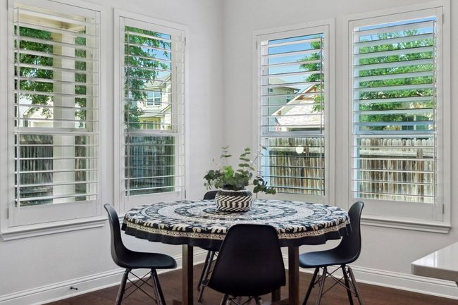 The dining nook features panoramic windows. | Image 17