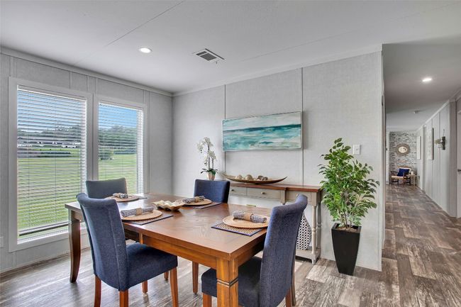 Dining area overlooking the backyard. | Image 13