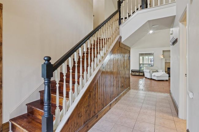 Staircase leads you the 2nd floor where there are 3 bedrooms and 2 full bathrooms. | Image 5