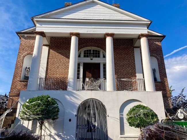Doorway to property with a balcony and brick siding | Image 37
