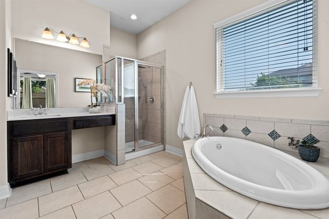 Soaking tub, separate shower, and separate vanities for a happy marriage! | Image 20