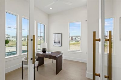 Home office with ceiling fan and light hardwood / wood-style flooring | Image 3