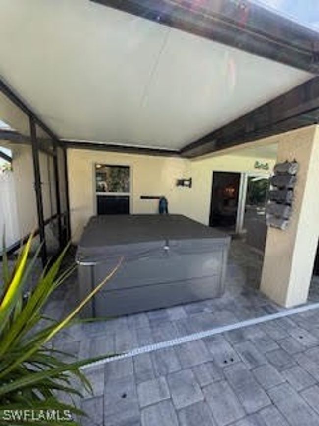 View of patio / terrace with a hot tub | Image 33