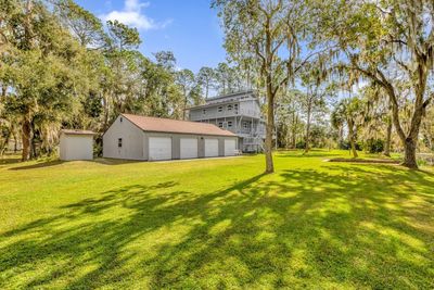 Property comes with a 4-car garage | Image 2