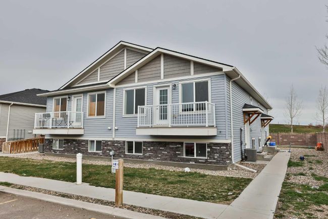 3 - 60 Cougar Cove N, Home with 3 bedrooms, 1 bathrooms and 1 parking in Lethbridge AB | Image 2