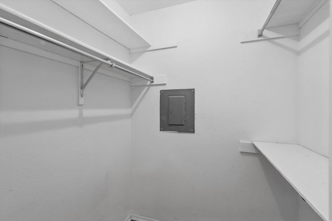 Spacious closet with electric panel | Image 10