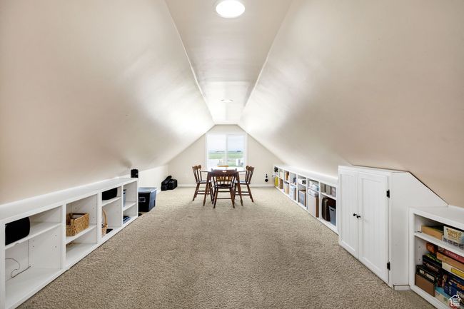 Bonus room featuring carpet floors and vaulted ceiling (not included in square footage) | Image 13