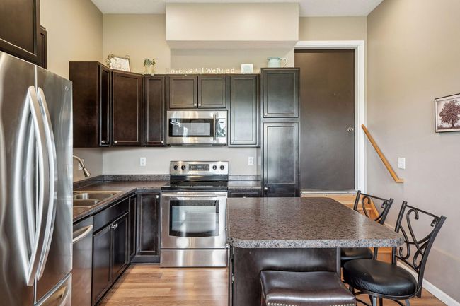 This home offers a beautiful and up to date Mother-in-Law unit! | Image 4