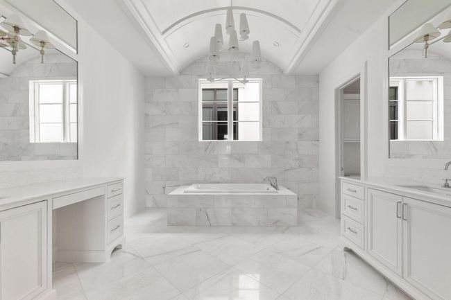 Unwind in the comfort of the built-in soaking tub, designed to offer a relaxing retreat with its timeless elegance and functional style. | Image 24