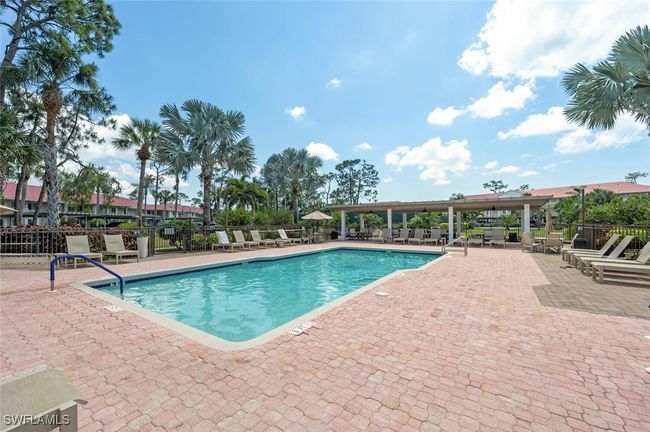 Community pool in Andover with a patio area and fence | Image 25