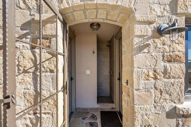 Lower level has a full pool bath plus office | Image 45
