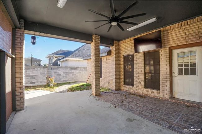 View of patio / terrace with ceiling fan | Image 9