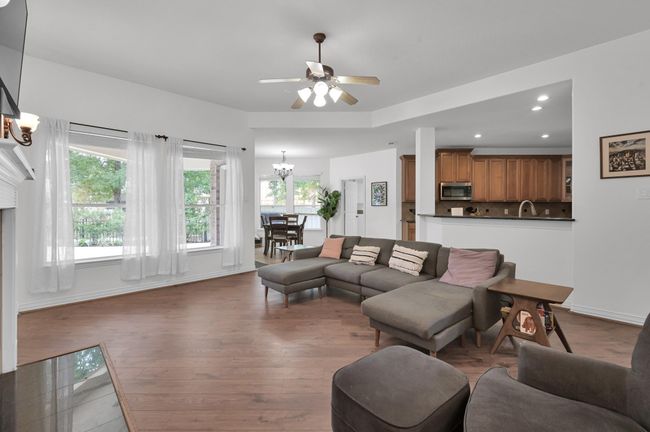 Plentiful windows line the back wall bringing in copious amounts of natural light. | Image 13