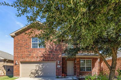 View of front property featuring a garage | Image 1