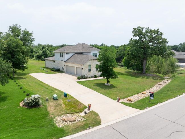 Full gutters and a 3-car side entry garage! | Image 31