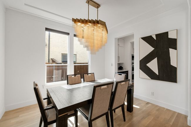 Dining space with light wood-type flooring and baseboards | Image 6